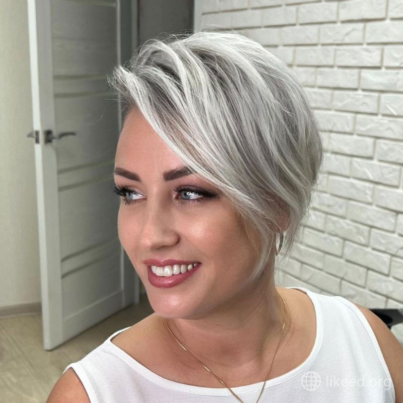 Sleek Silver Blonde Asymmetrical Bob