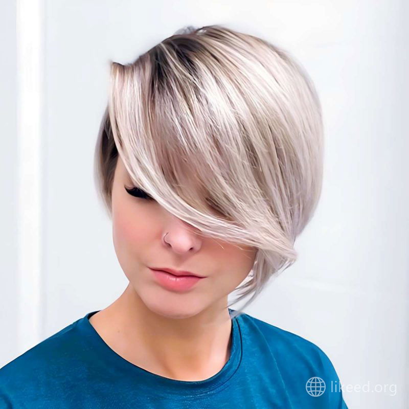 Sleek Platinum Asymmetrical Bob with Long Fringe